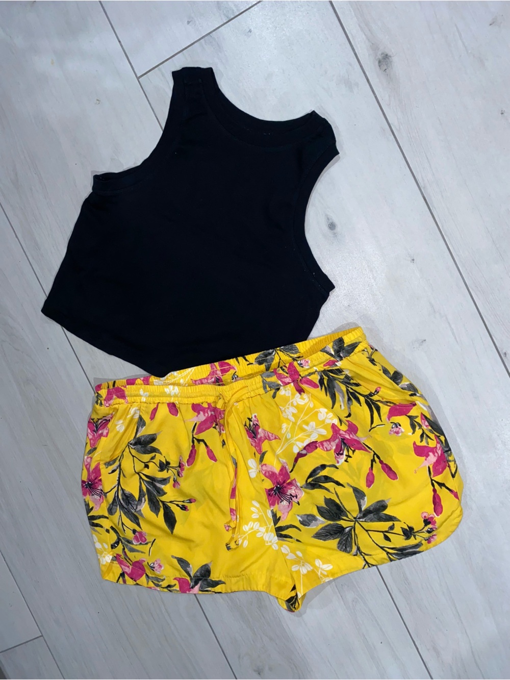 west loop Yellow Floral shorts  with Pink Accents with black tank top shirt
